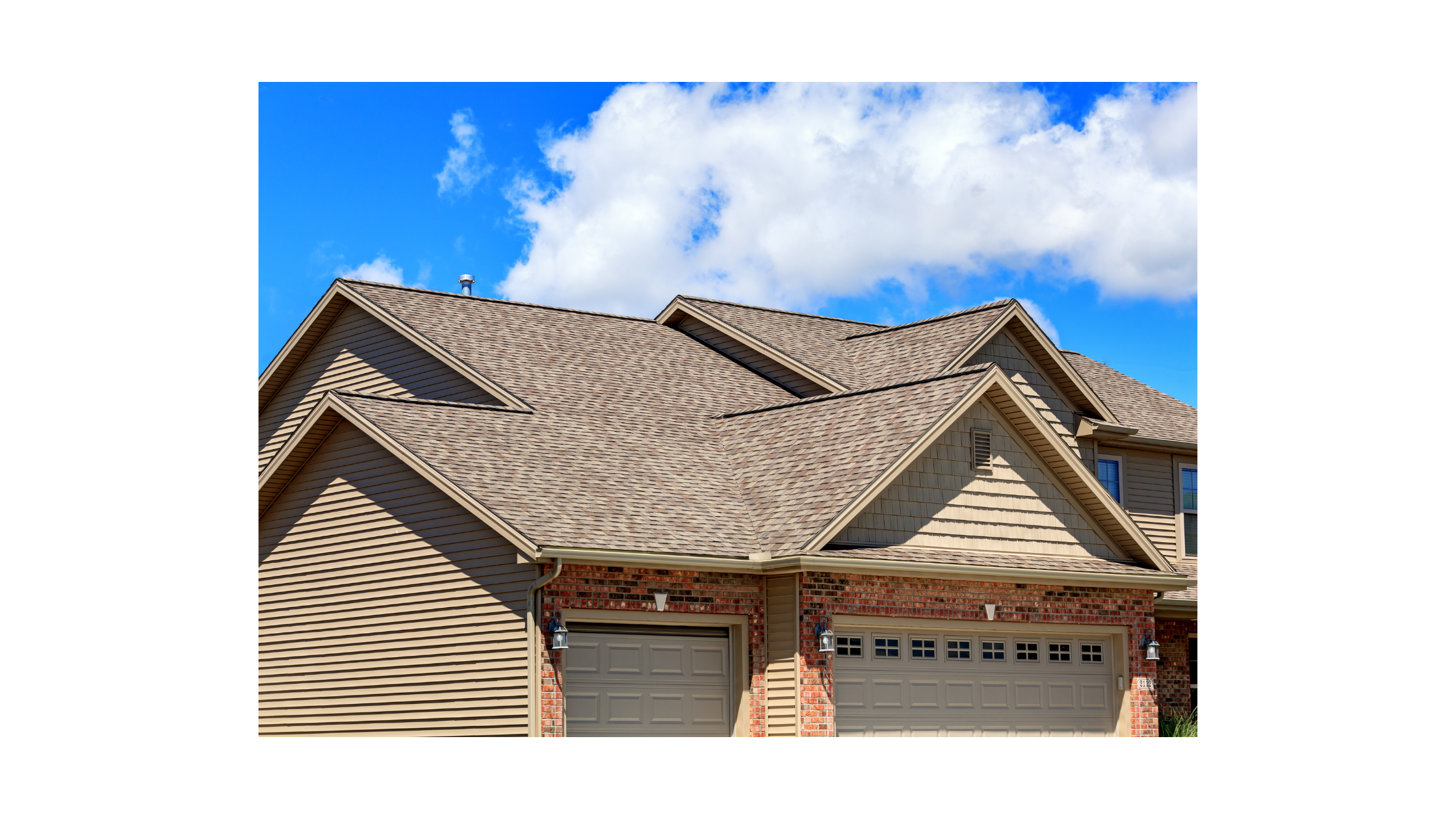 A house with a garage and a blue sky

AI-generated content may be incorrect.