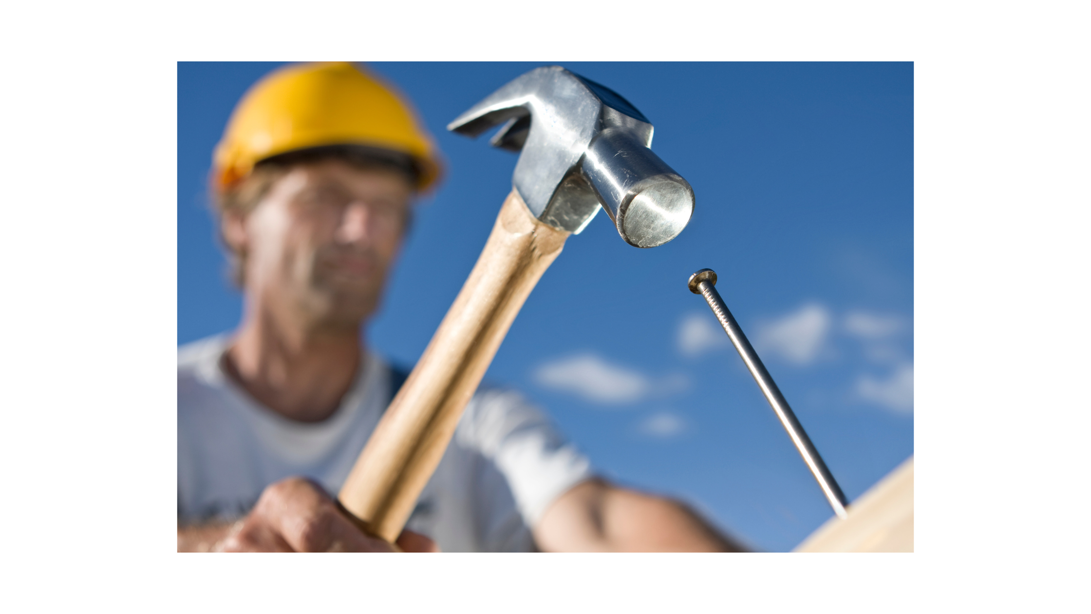 A person holding a hammer and nail AI-generated content may be incorrect.